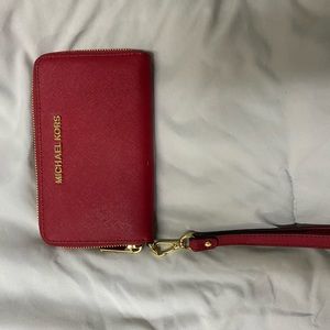 Red Michael kors wristlet